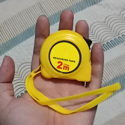 metre ruban en mains deux mètre